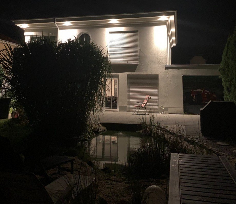 R�ckansicht Nacht Einfamilienhaus L�dinghausen